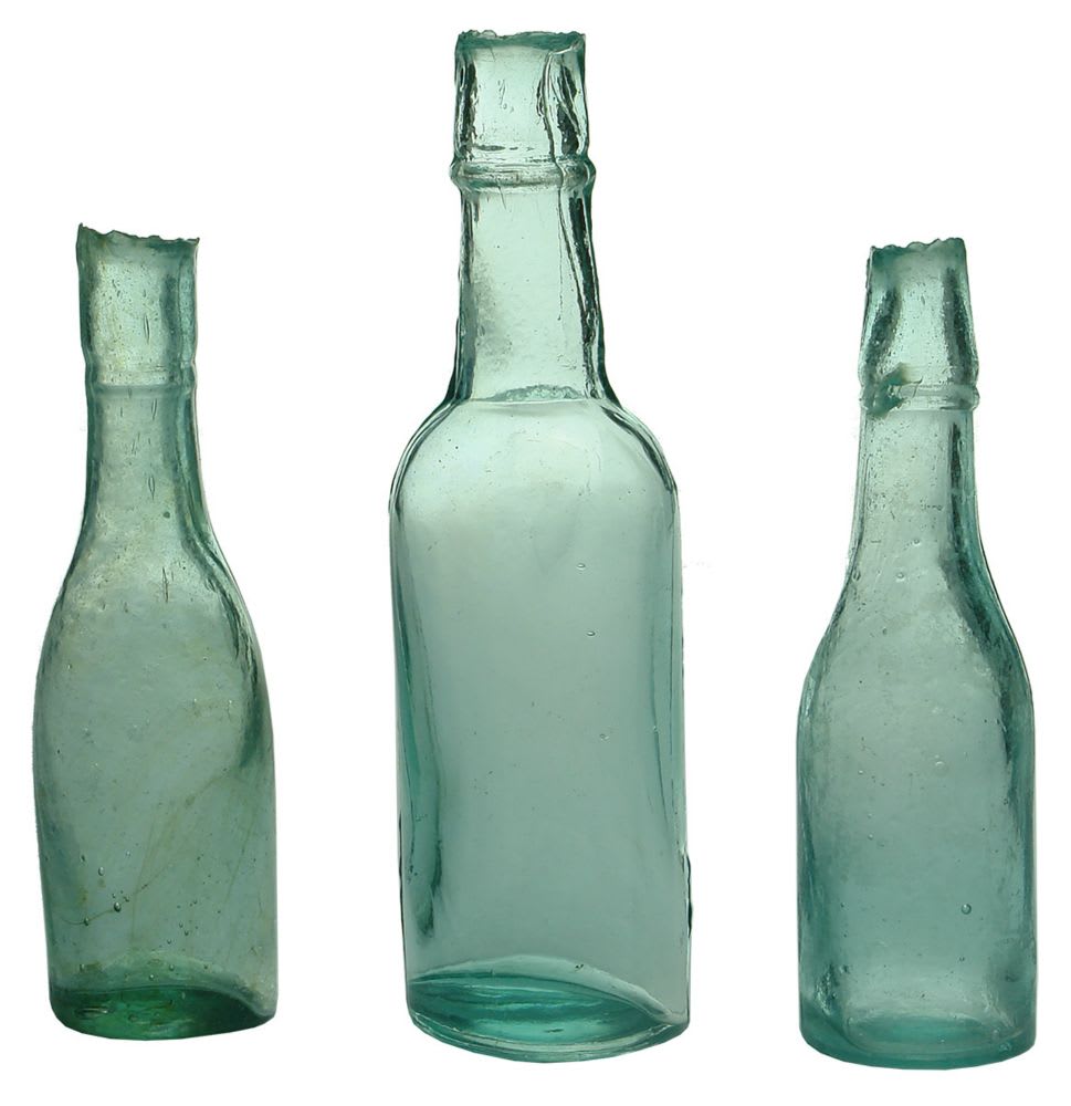 Three small shear lip bottles