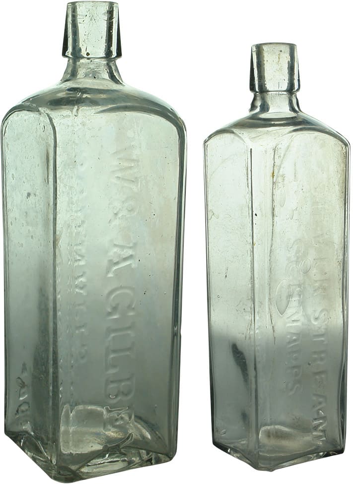 Large and small Gilbey Silverstream Schnapps. Clear Glass.