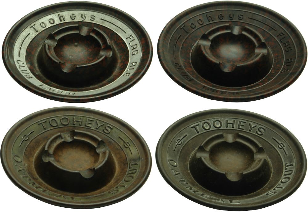 Four Beer Advertising Ashtrays. Tooheys Flag Ale and Oatmeal Stout. Bakelite.