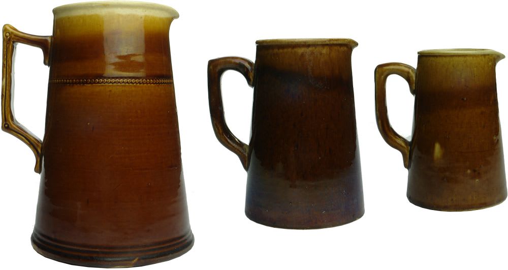 Three conical jugs. Bendigo Pottery.