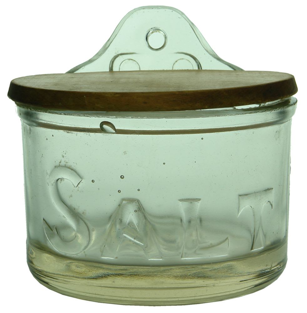 Wall mounted large glass SALT jar with wooden lid.