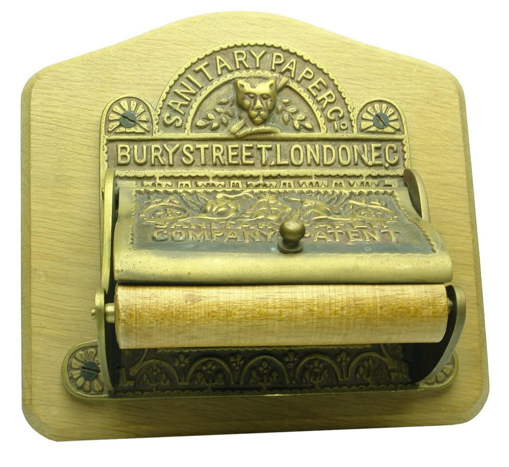 Brass and Wood Toilet Roll Holder. Sanitary Paper Co., London.