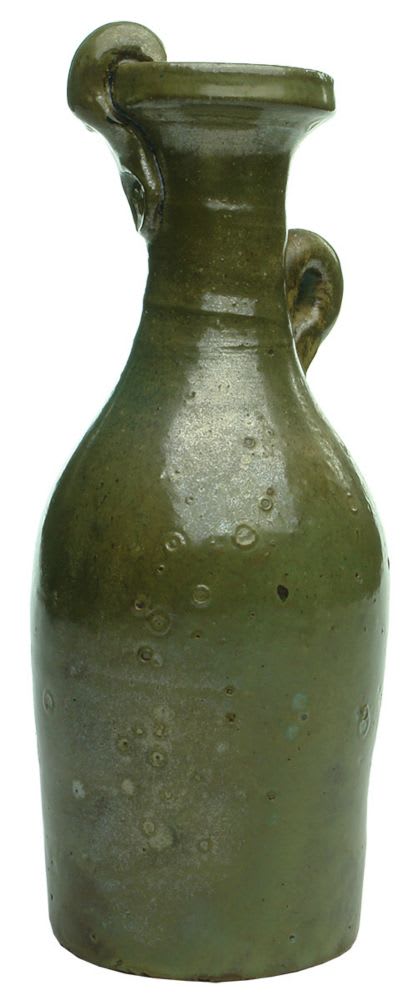 Unusual studio pottery jug with small looped handle
