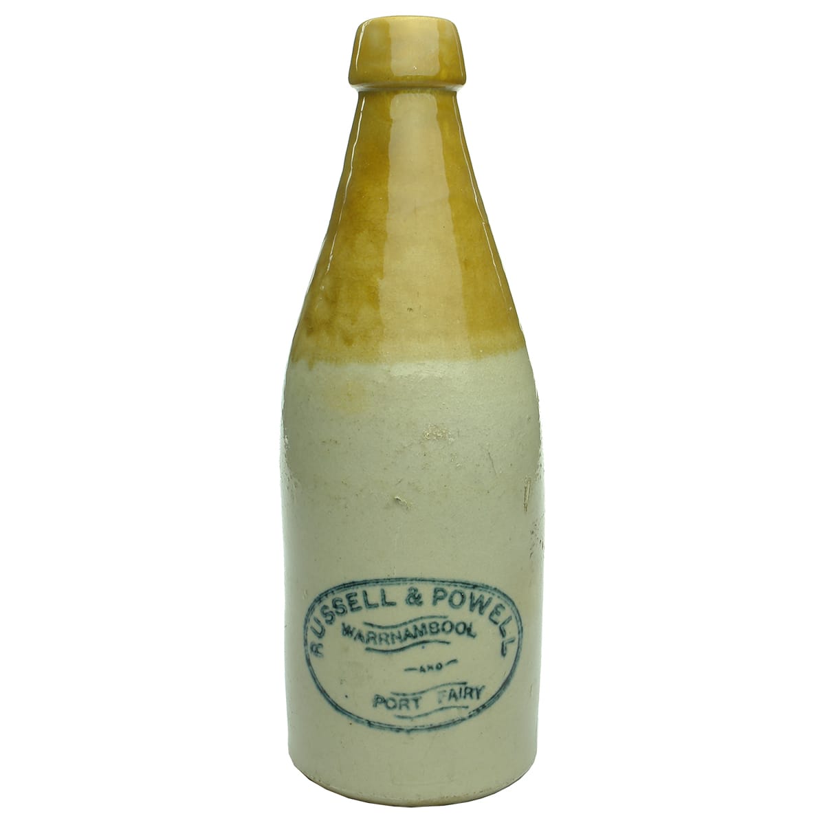 Ginger Beer.  Russell & Powell, Warrnambool and Port Fairy.  Champagne.  Internal thread.  Tan top.  26 oz.