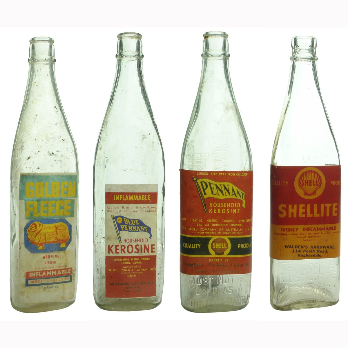 Four Kerosene / Methylated Spirits bottles with labels.