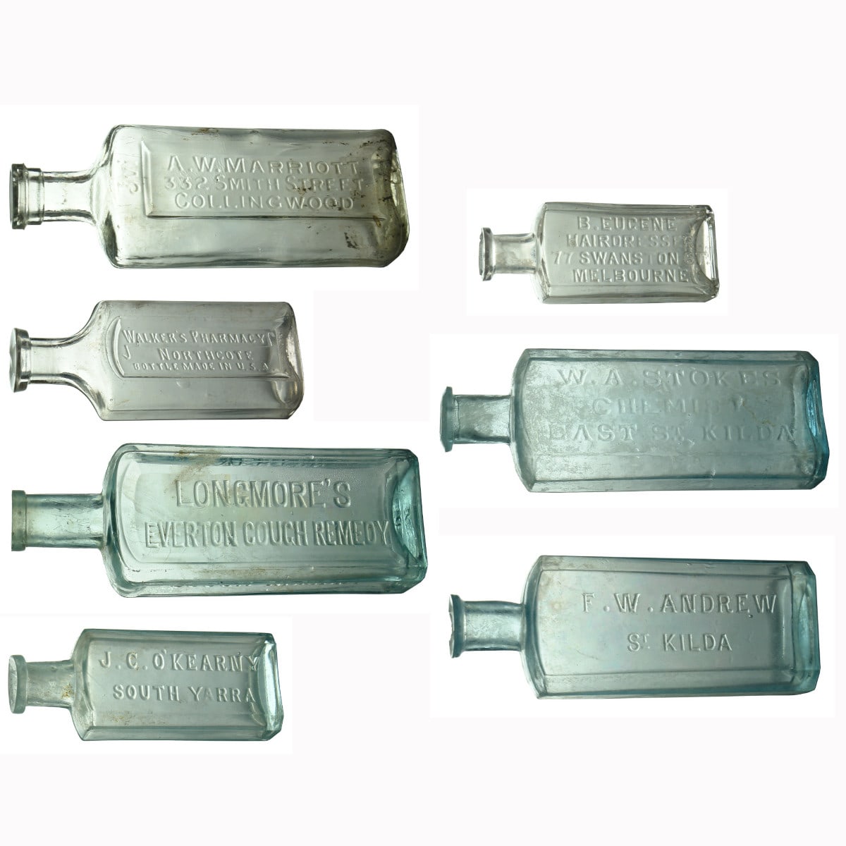 Seven Melbourne Chemist type bottles.