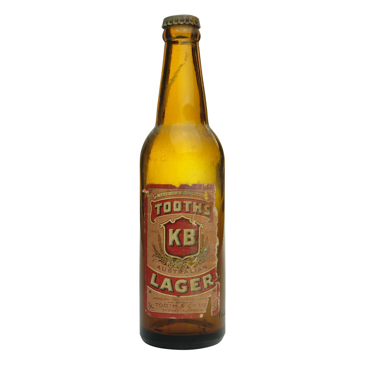 Beer. Labelled Tooth's KB Australian Lager. Amber. Crown Seal. 13 oz.