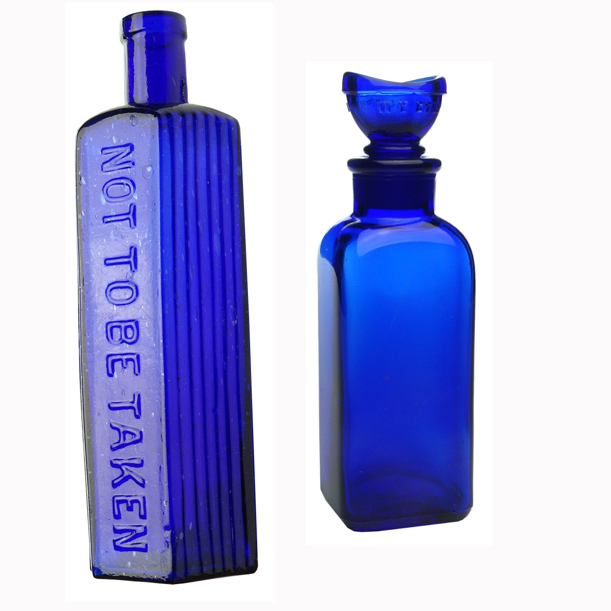 Two Cobalt Blue Bottles: Not to Be Taken Poison and Wyeth Collyrium