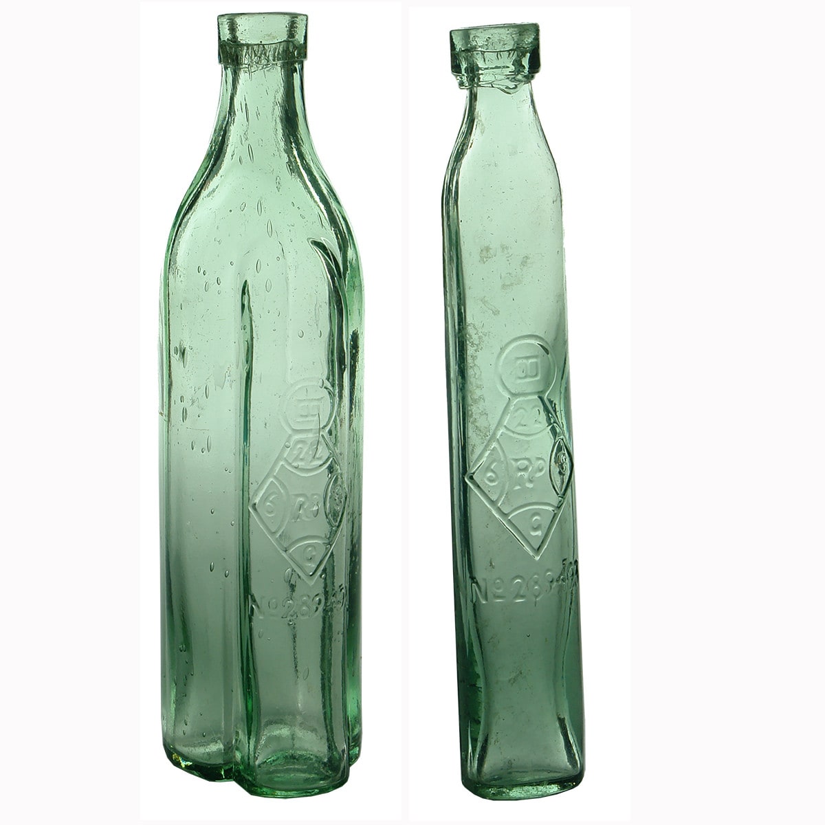 Goldfields. Registered double bottle, one thin and one larger bottle with convex side that thin bottle slots into.  Aqua.