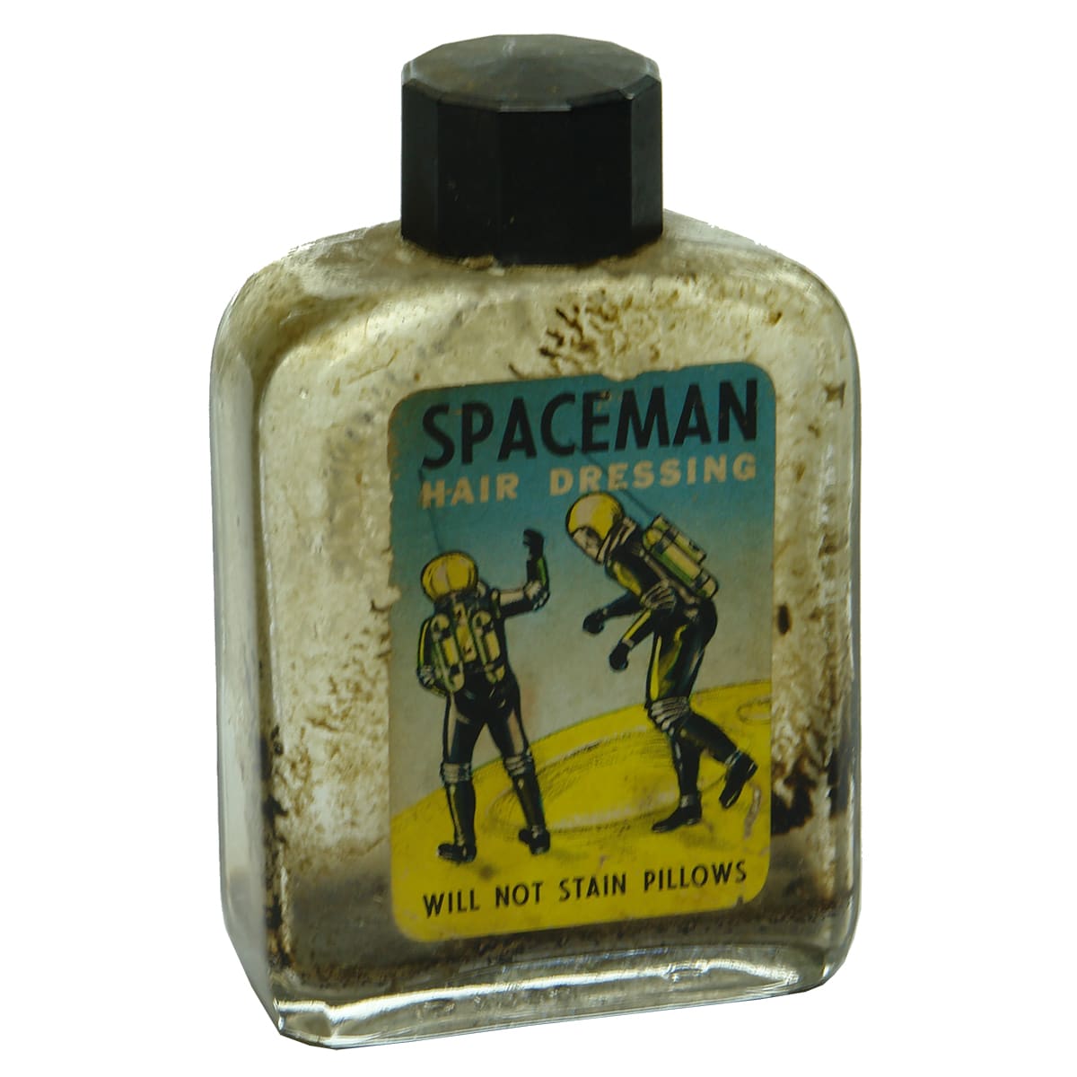 Modern Cosmetics with label for Spaceman Hair Dressing.