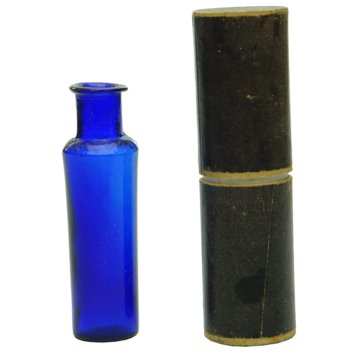 Poison. Flared lip cylinder in cardboard container.
