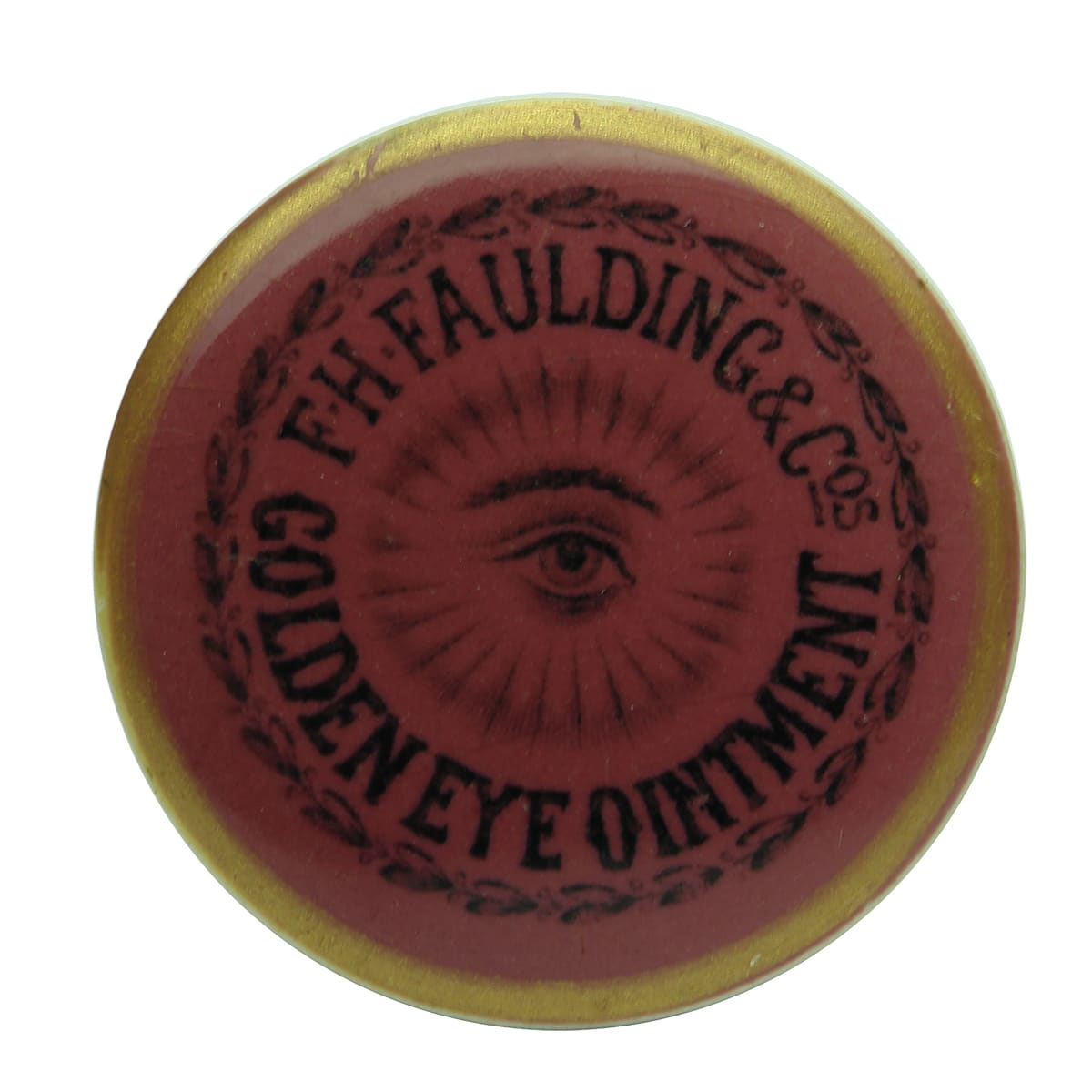 Pot Lid. Faulding, Golden Eye Ointment. Black on Pink. (South Australia)