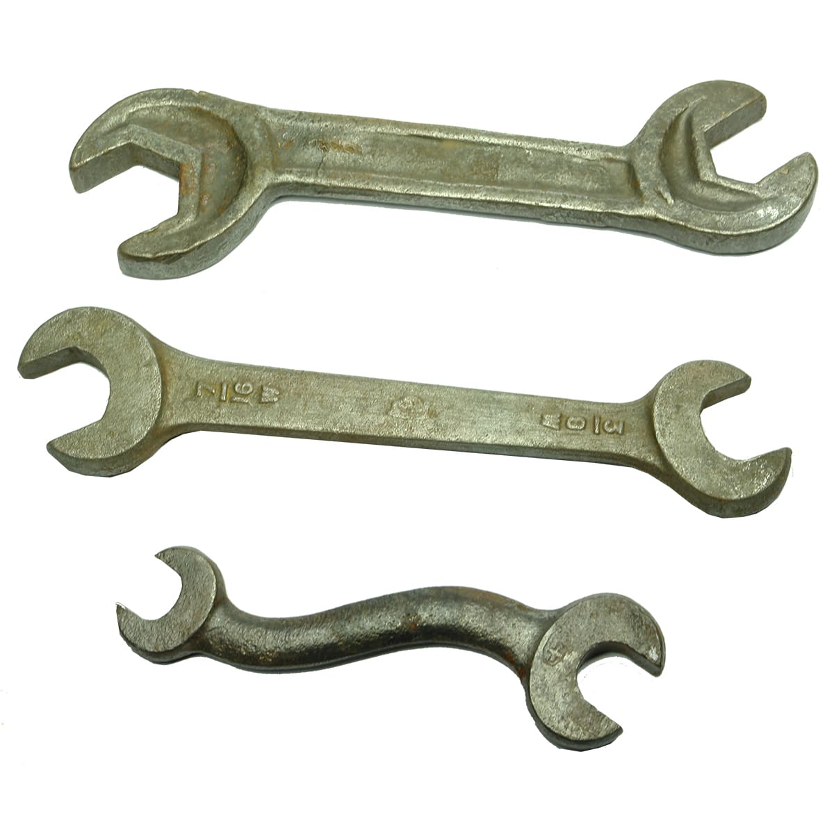 Three old spanners.