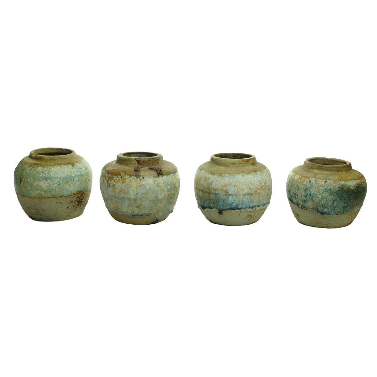 Four green glazed Chinese ginger jars.