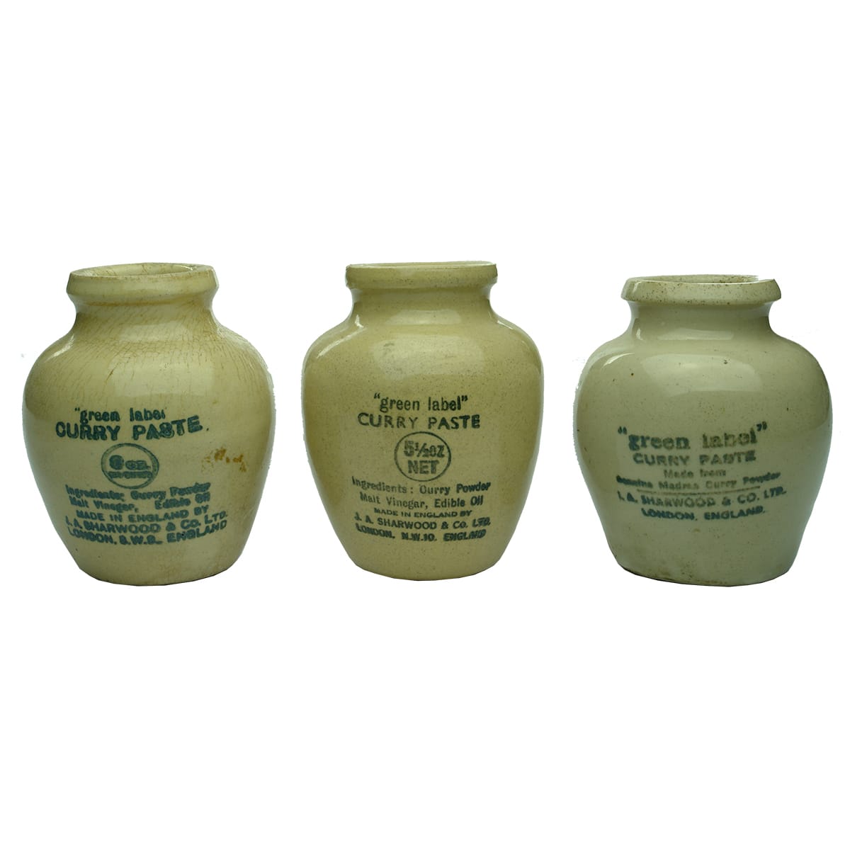 Three different Sharwood, London "green label" curry paste jars.