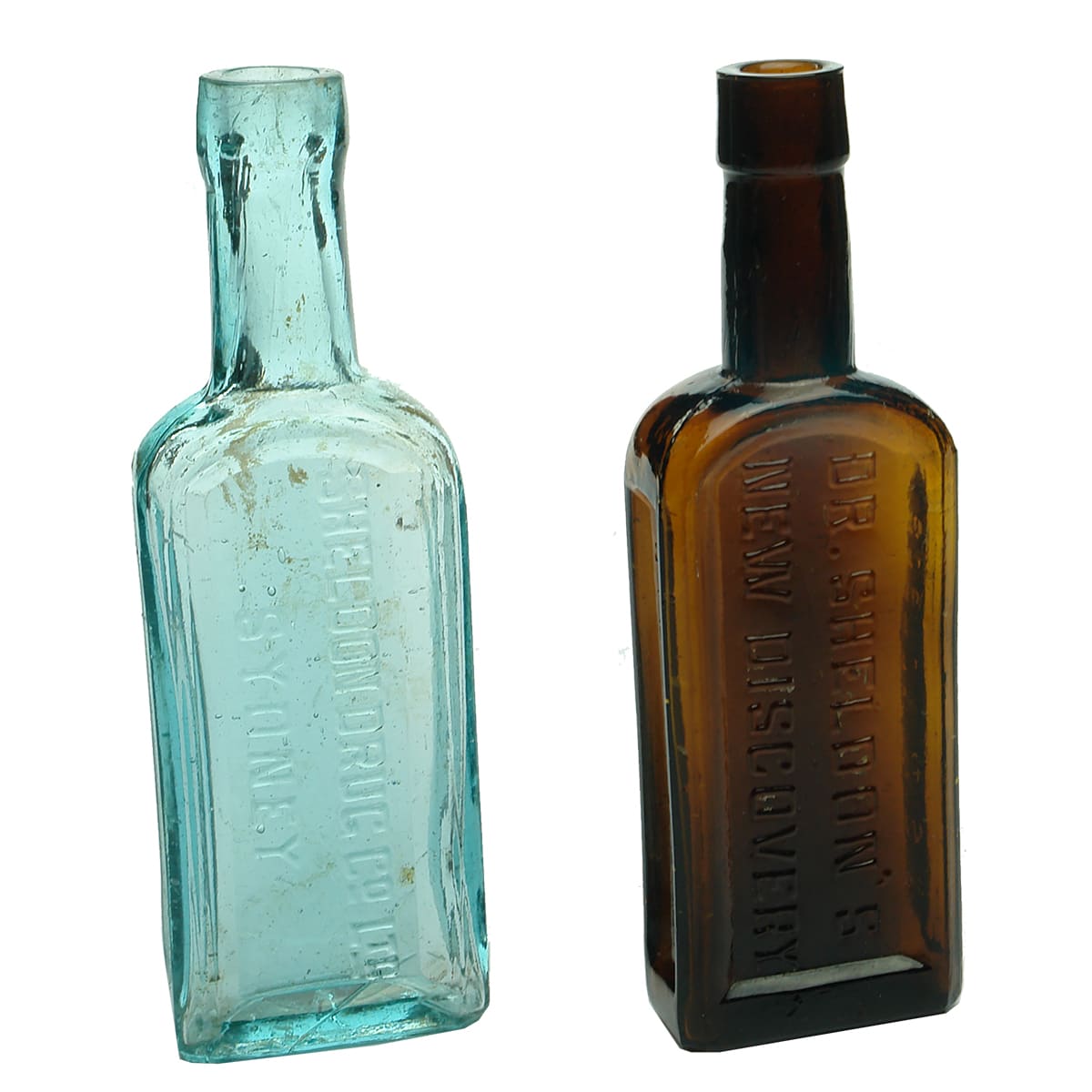 Pair of Dr Sheldons bottles. Aqua & Amber. (New South Wales)