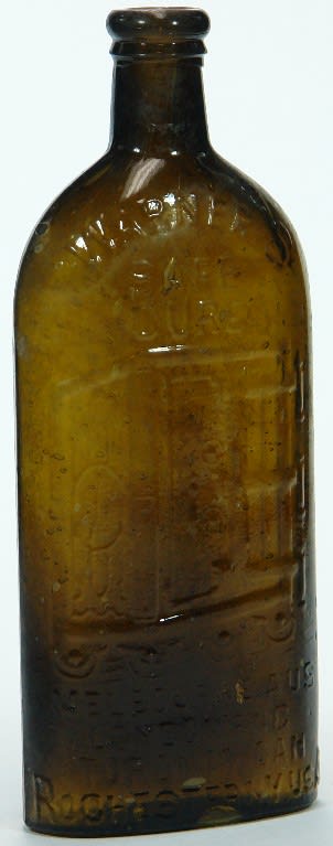 Warners Safe Cure Four Cities Olive glass bottle