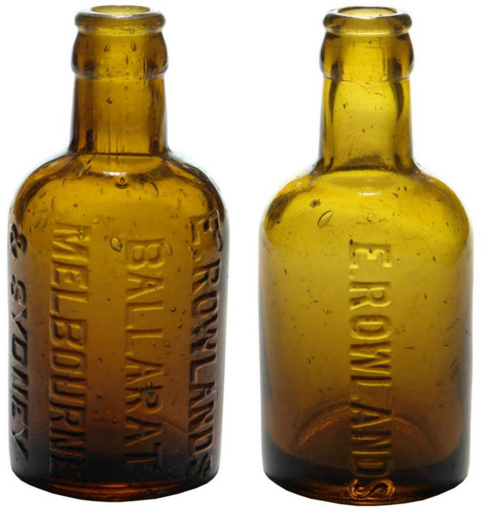 Pair Rowlands Dump Amber Crown Seal Bottles