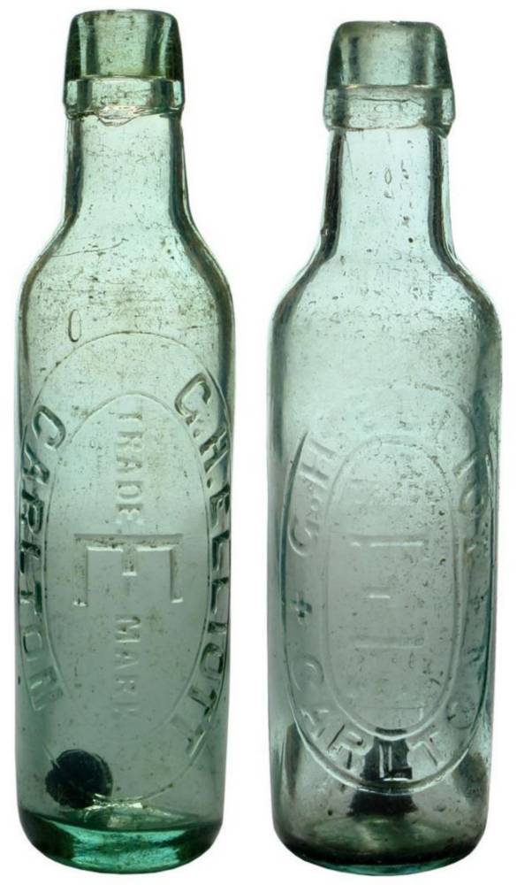 Pair Elliott Carlton Lamont Patent Bottles