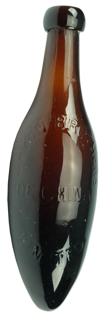 Dakin Brothers China Amber Glass Torpedo Bottle