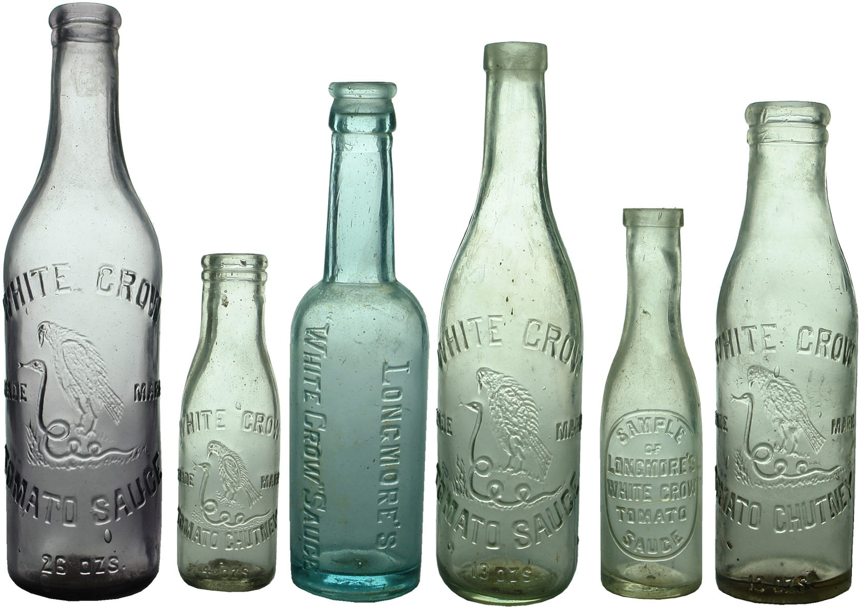 Antique White Crow Sauce Bottles