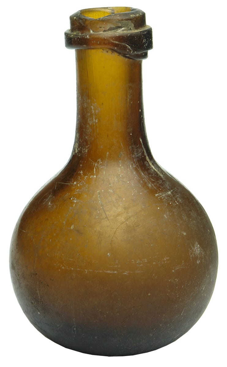 Antique Globe Amber Glass Bottle