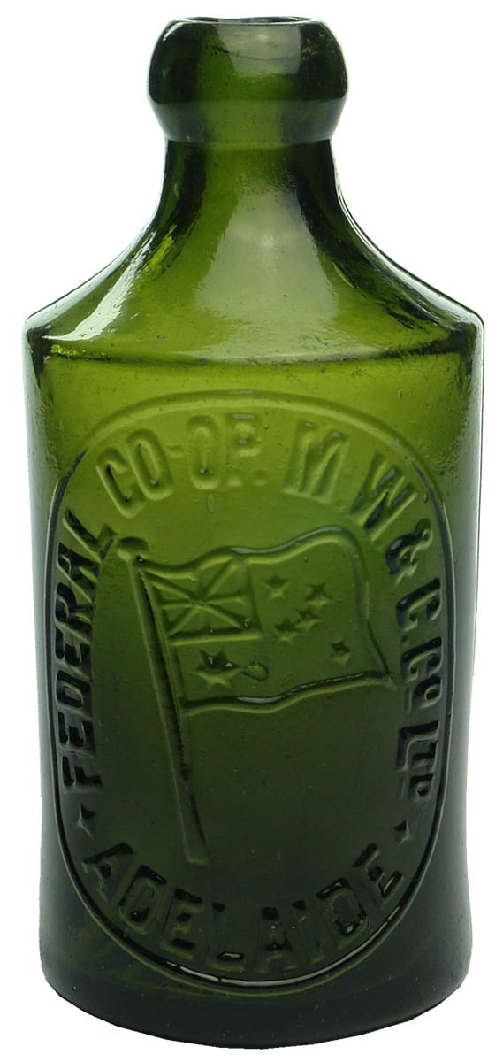 Federal Adelaide Green Glass Dump Bottle