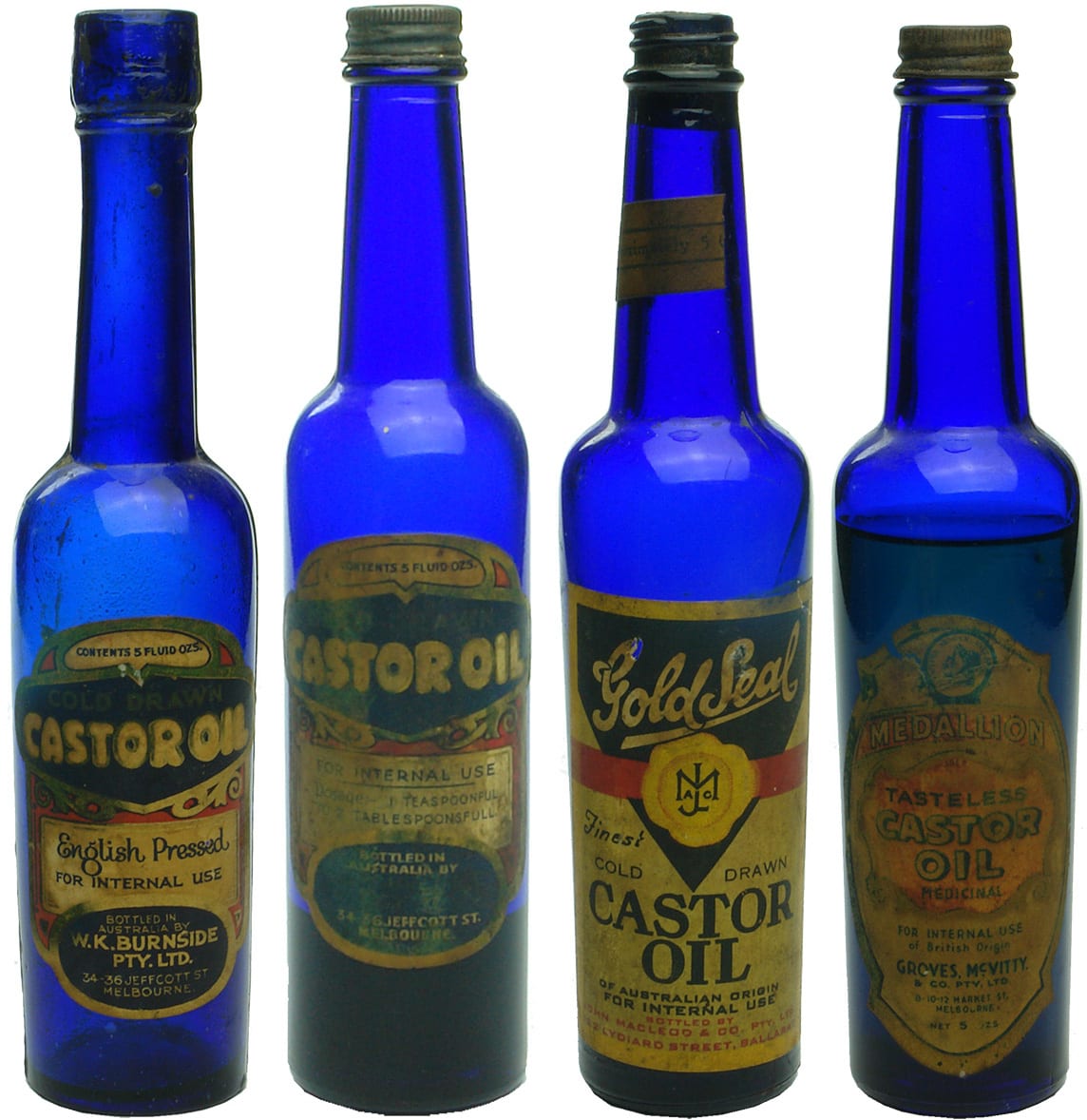 Vintage Labelled Blue Glass Castor Oil Bottles