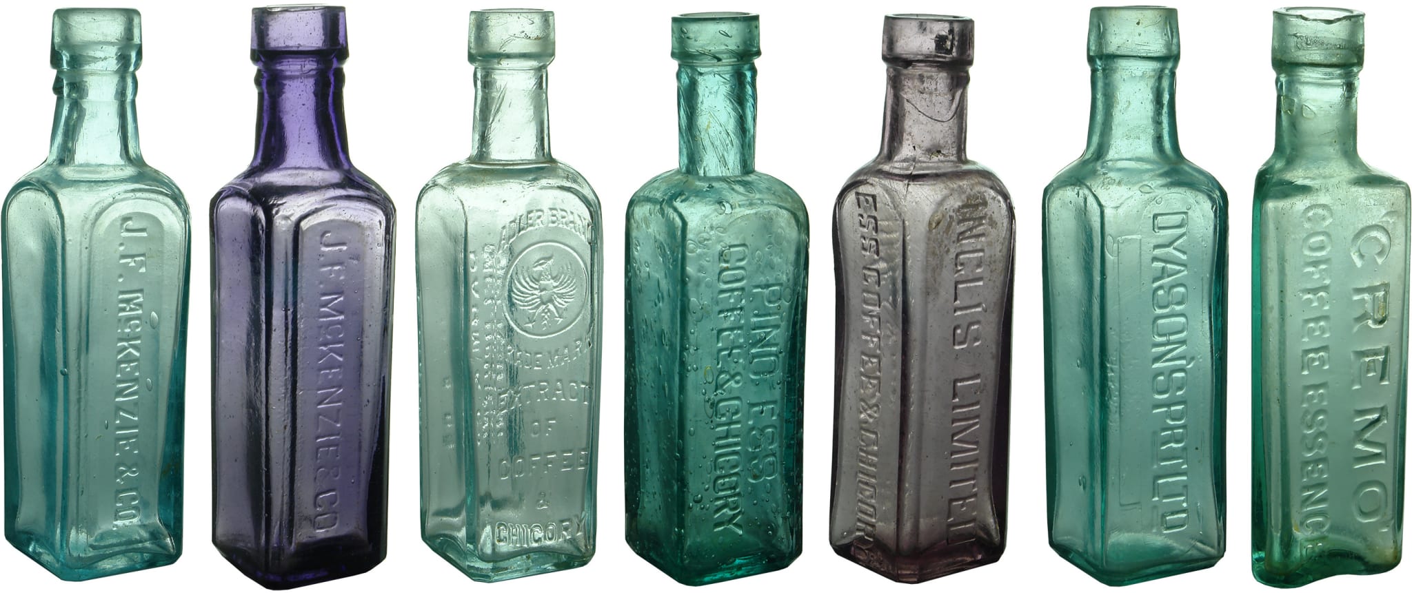 Seven Antique Coffee Essence Bottles