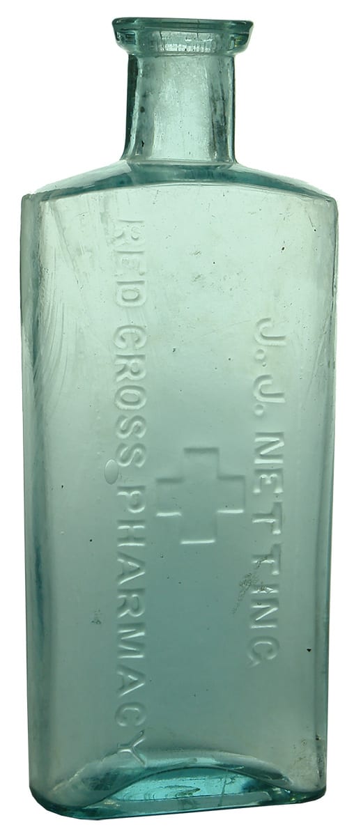 Netting Red Cross Pharmacy Antique Bottle