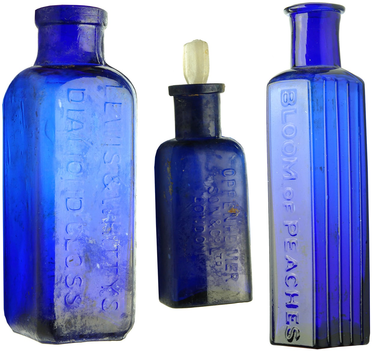Three Antique Cobalt Blue Bottles