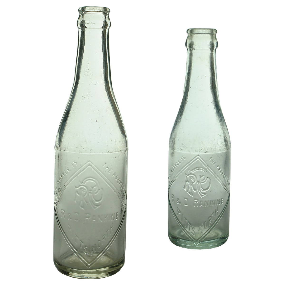 Pair of Crown Seals. Rankine, Pittsworth. Champagne. Clear & Aqua. 10 & 6 oz. (Queensland)