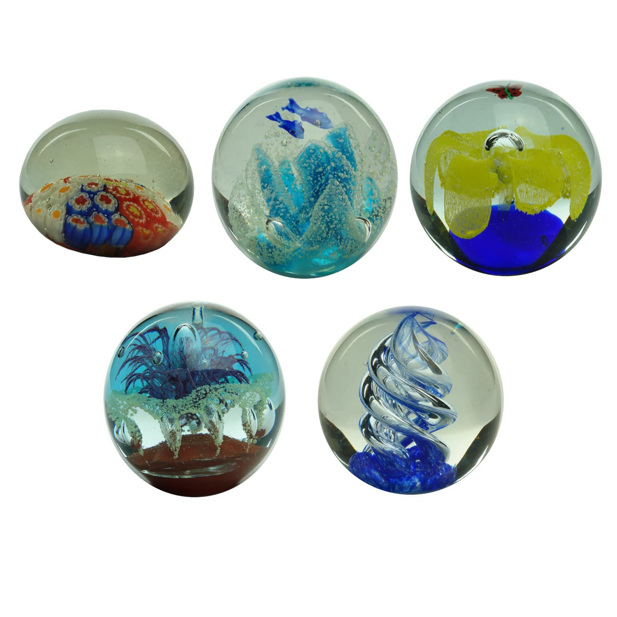 Five Glass Paperweights: Colourful Floral Design; Two Fish; Butterfly over Flower; Purple, White and Red Floral Design; Swirled air and blue design.