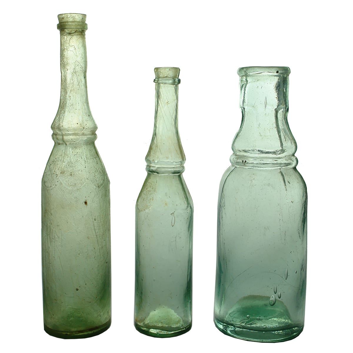 Three Goldfields Bottles. All Coward's style. Large and small Salad Oil and a Pickle.