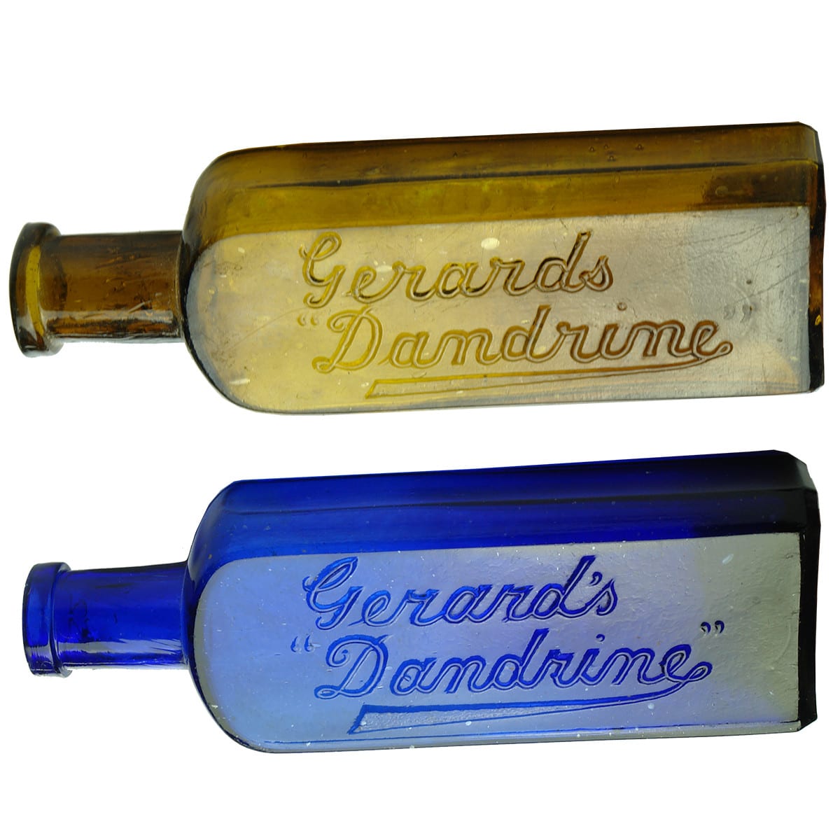 Pair of Gerard's "Dandrine" Bottles: Cobalt and Amber. (Queensland)