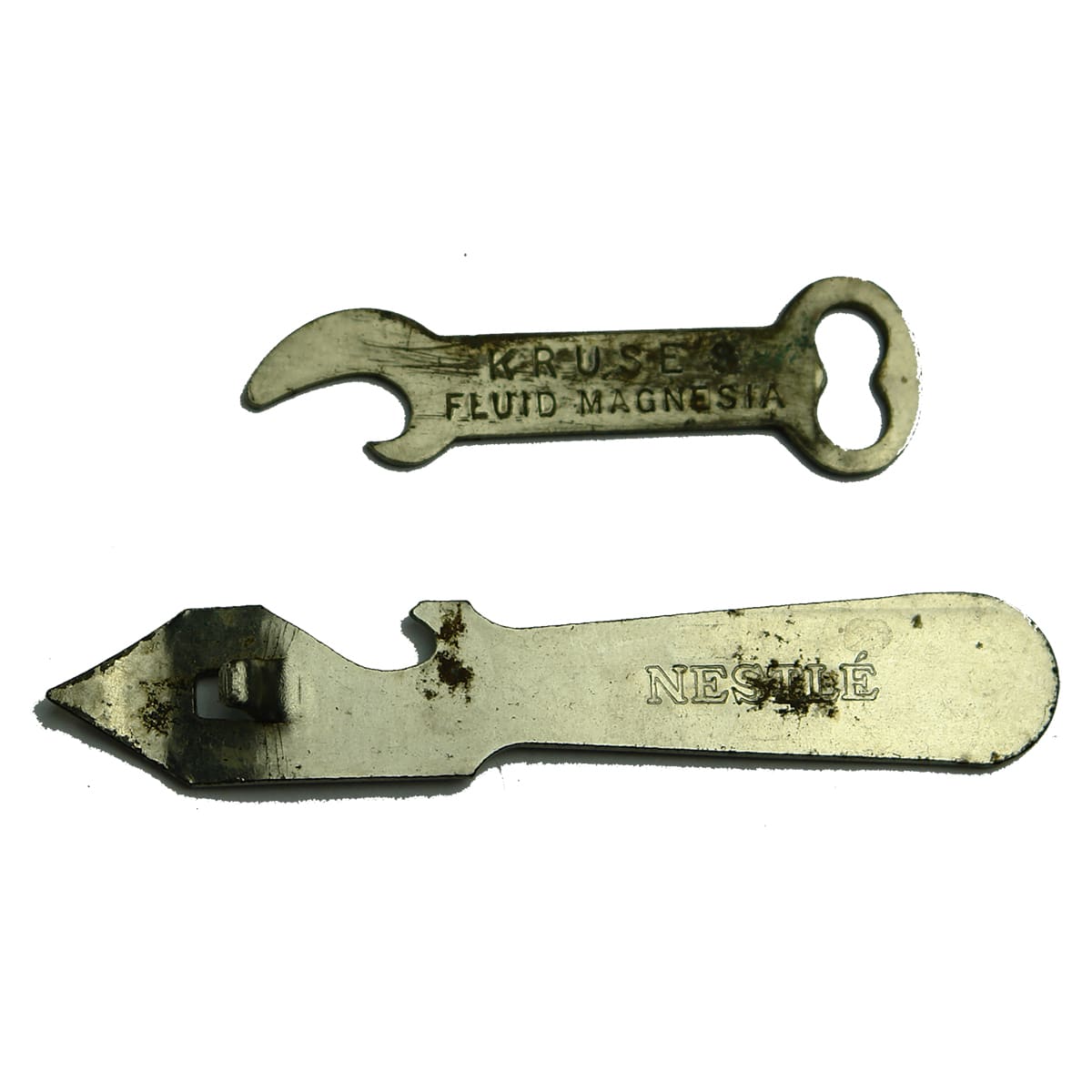 Bottle openers. Kruse's Fluid Magnesia; Nestle Liquid Lactogen.