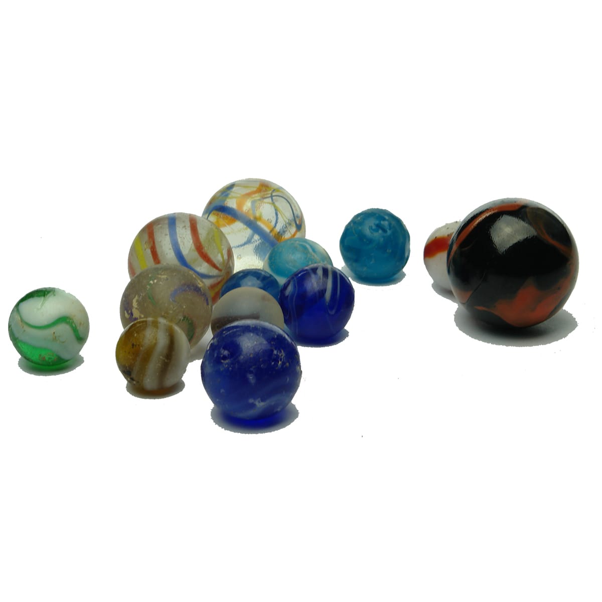 Marbles. 13 various marbles in different sizes and colours.