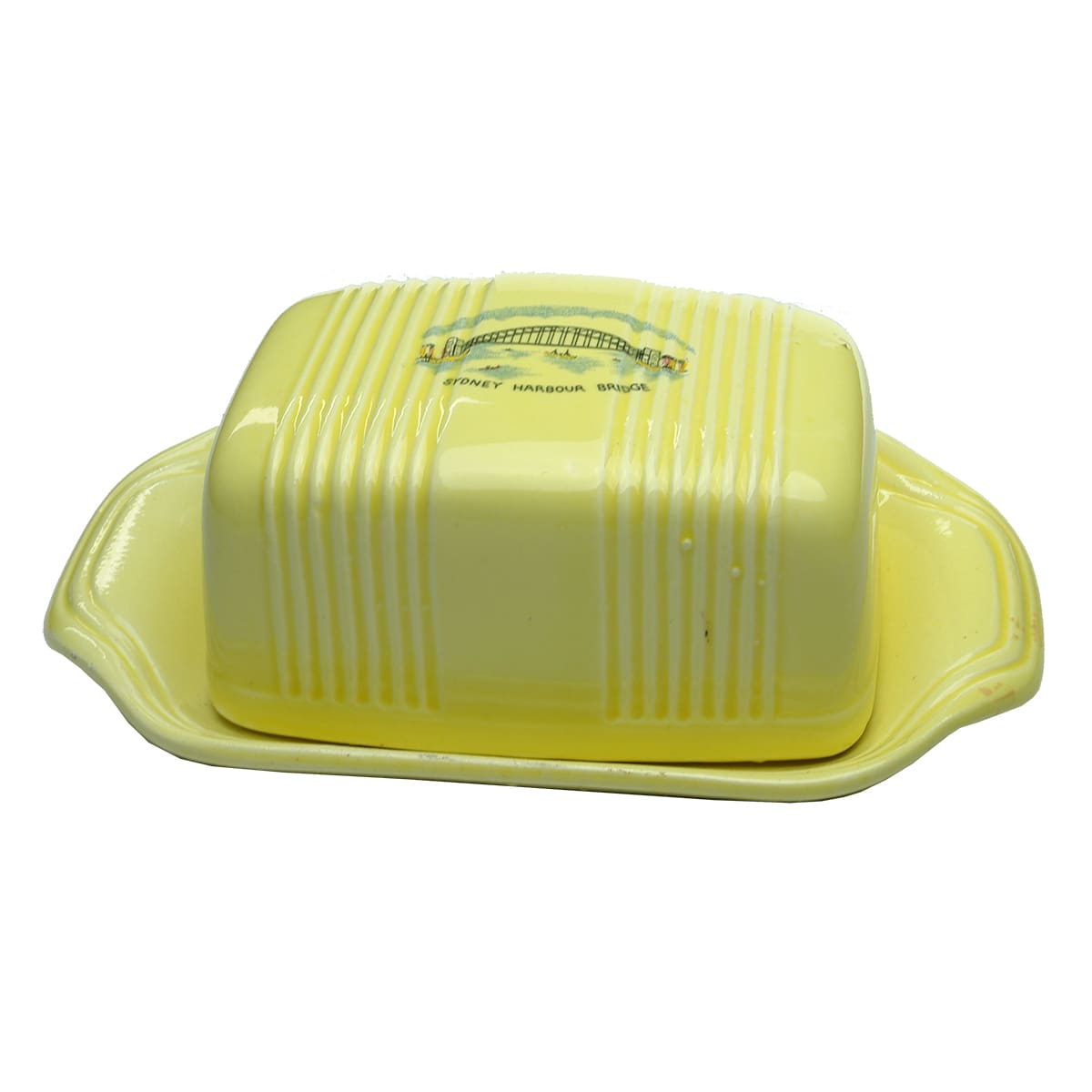 Butter dish. Sydney Harbour Bridge. Yellow with coloured print.