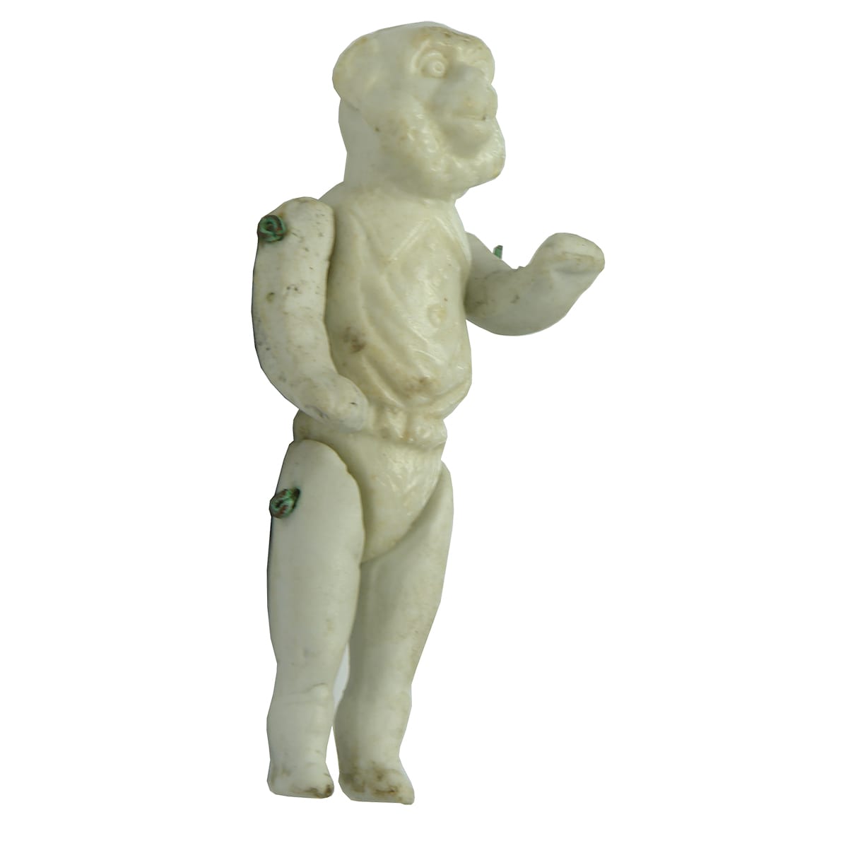 Doll. Small porcelain monkey with detached arms and legs.