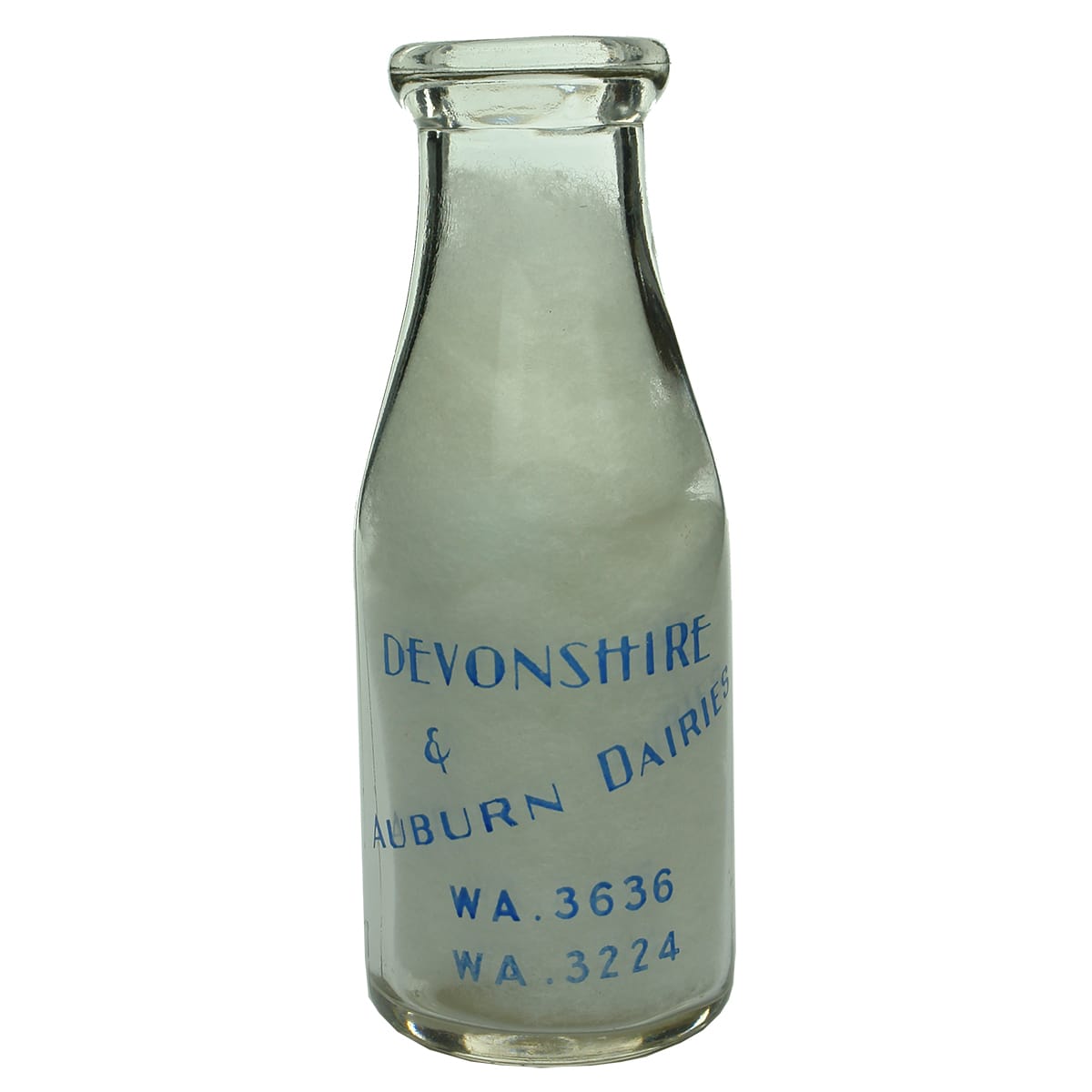 Milk. Devonshire & Auburn Dairies. Wad lip. Ceramic label. 1 Pint. (Victoria)
