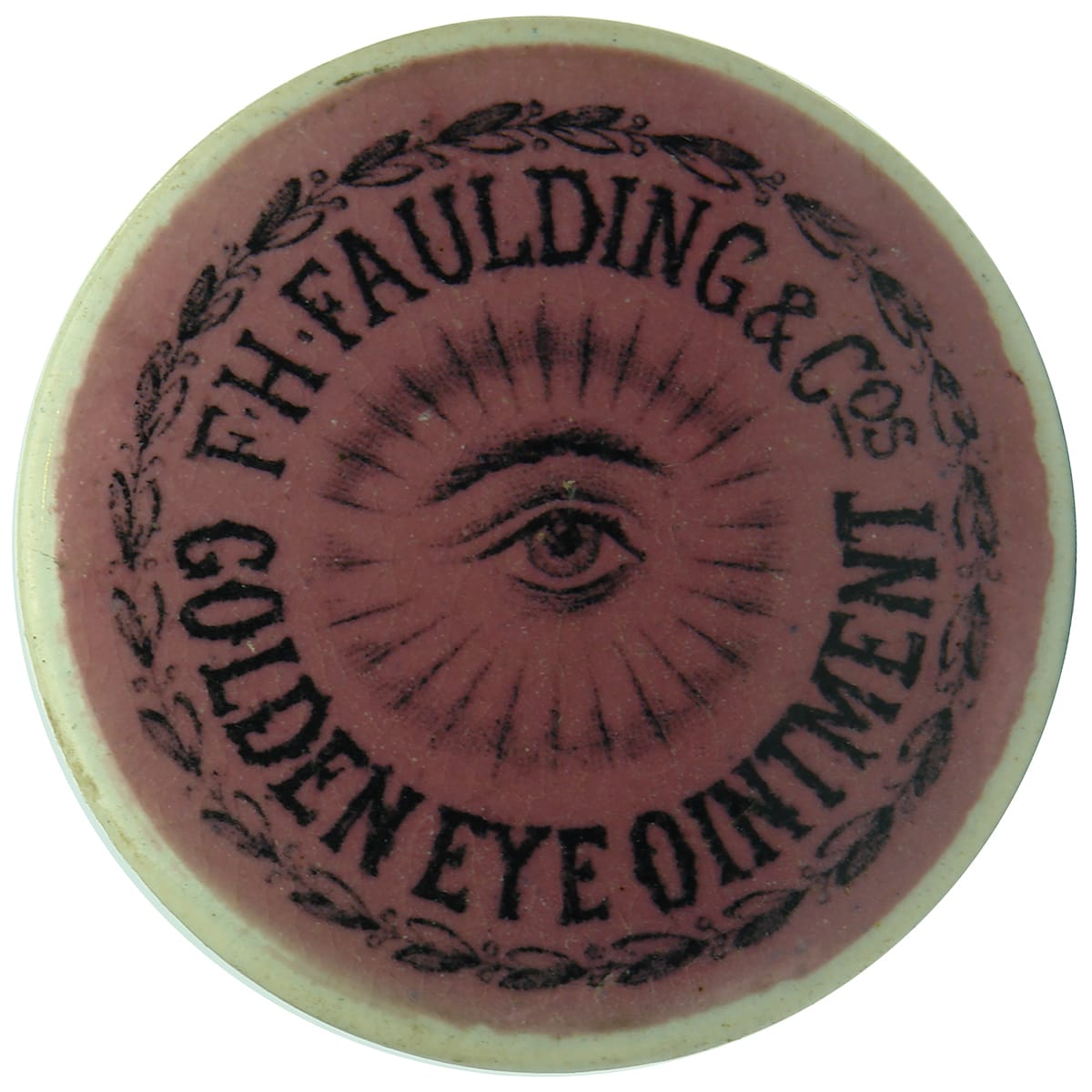 Pot Lid. Faulding, Golden Eye Ointment. Black on Pink. (South Australia)