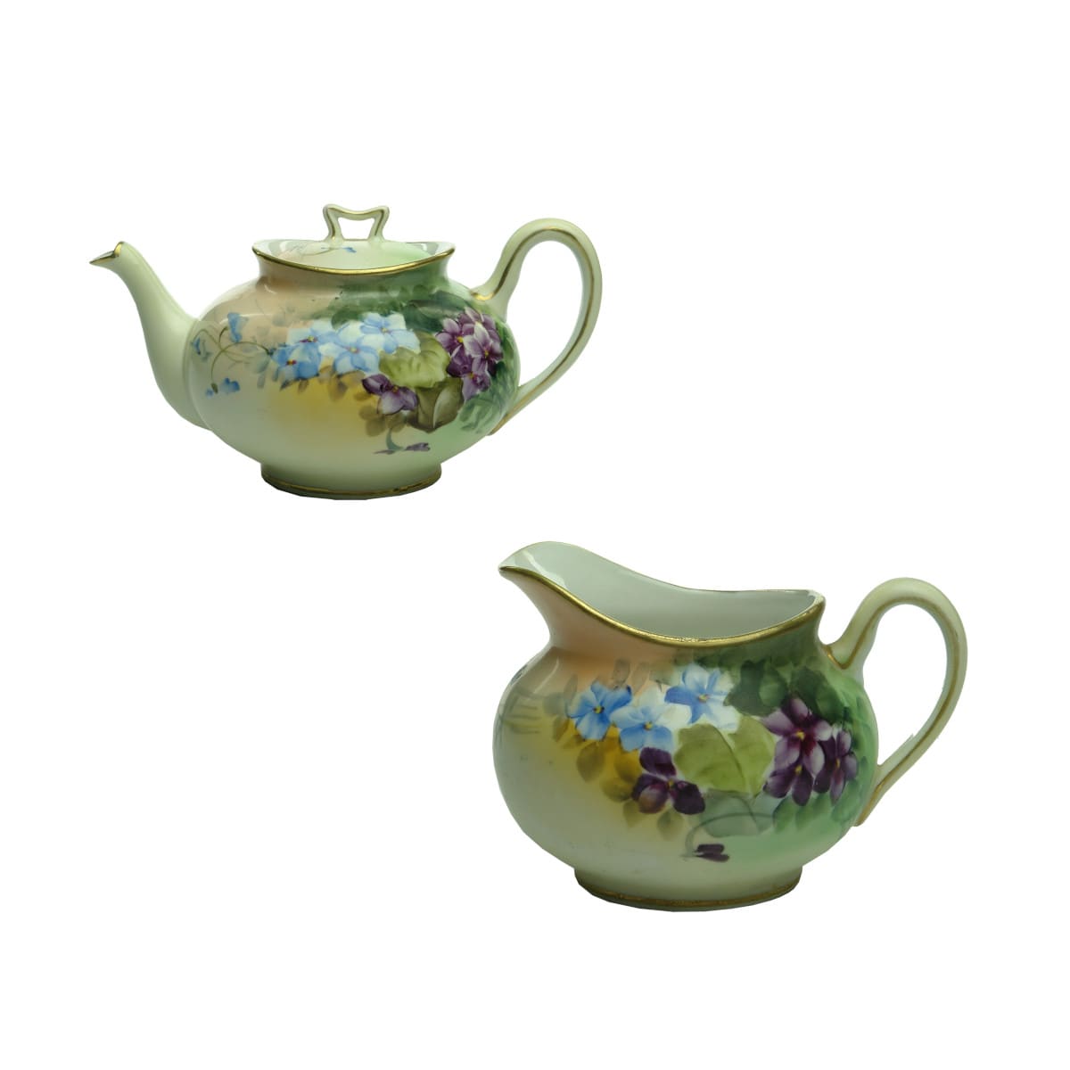 Pottery. Hand Painted Nippon Teapot and Milk Jug.