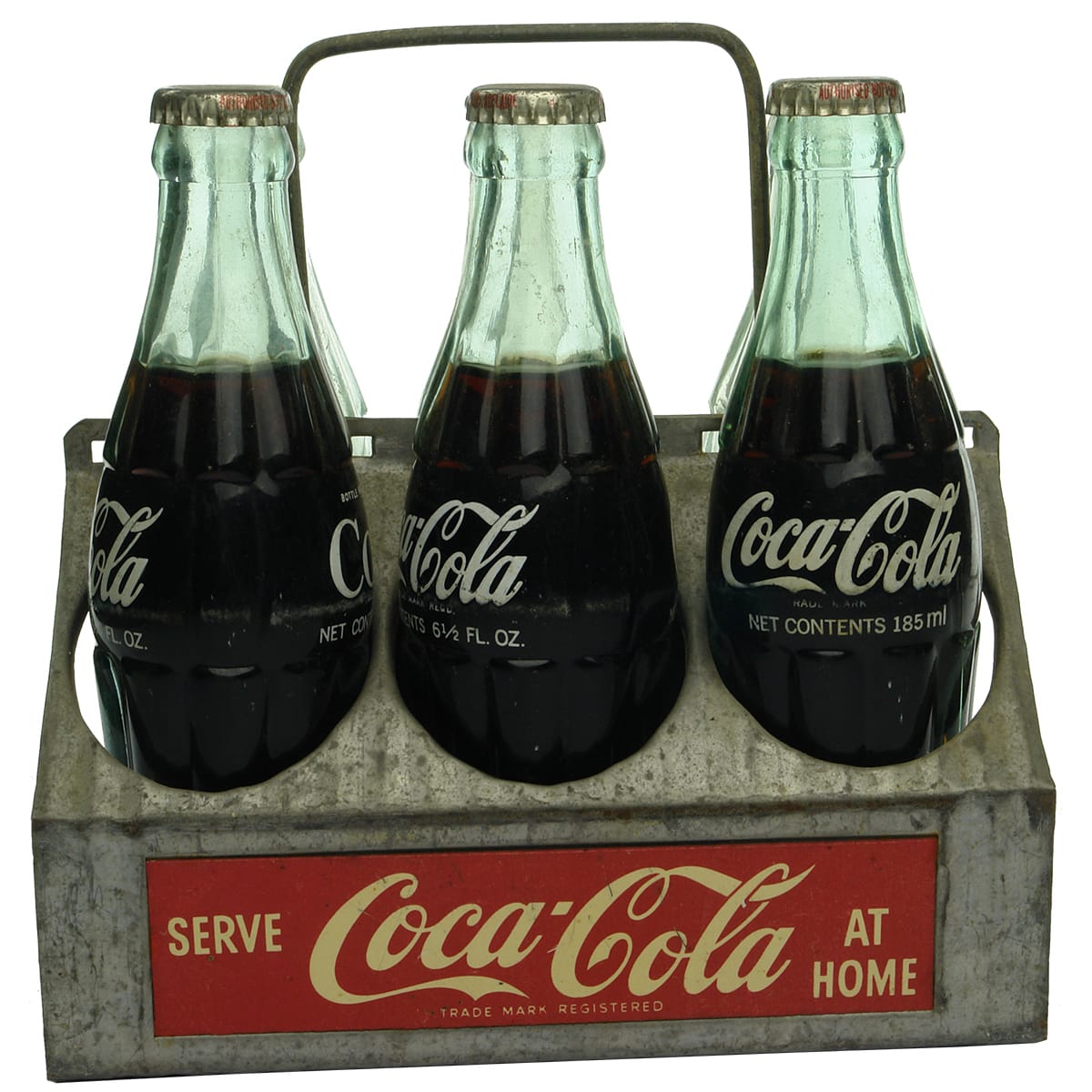 Advertising. Coke Tin Six Bottle Carrier with Six Bottles - Three are full.