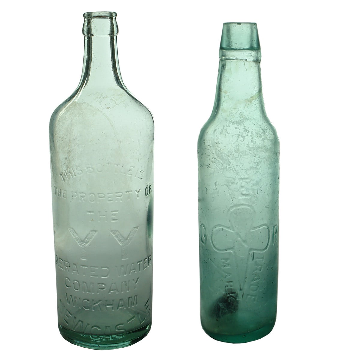 Pair of Newcastle Bottles: YY Aerated Water, Wickham crown seal. Redman Lamont. (New South Wales)