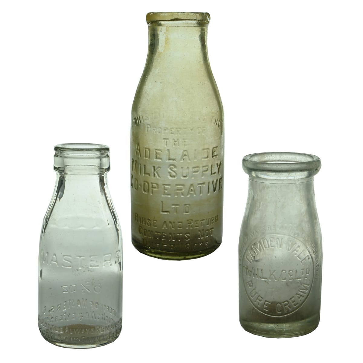 Three Milk or Cream bottles: Adelaide Milk Supply; Masters Dairy; Camden Vale Milk Co.