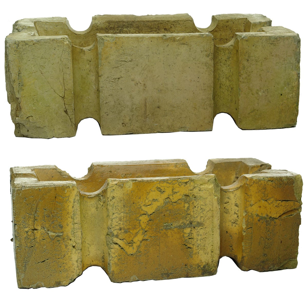 Bricks. Pair of unusual bricks with deep grooves and hollowed out inner.