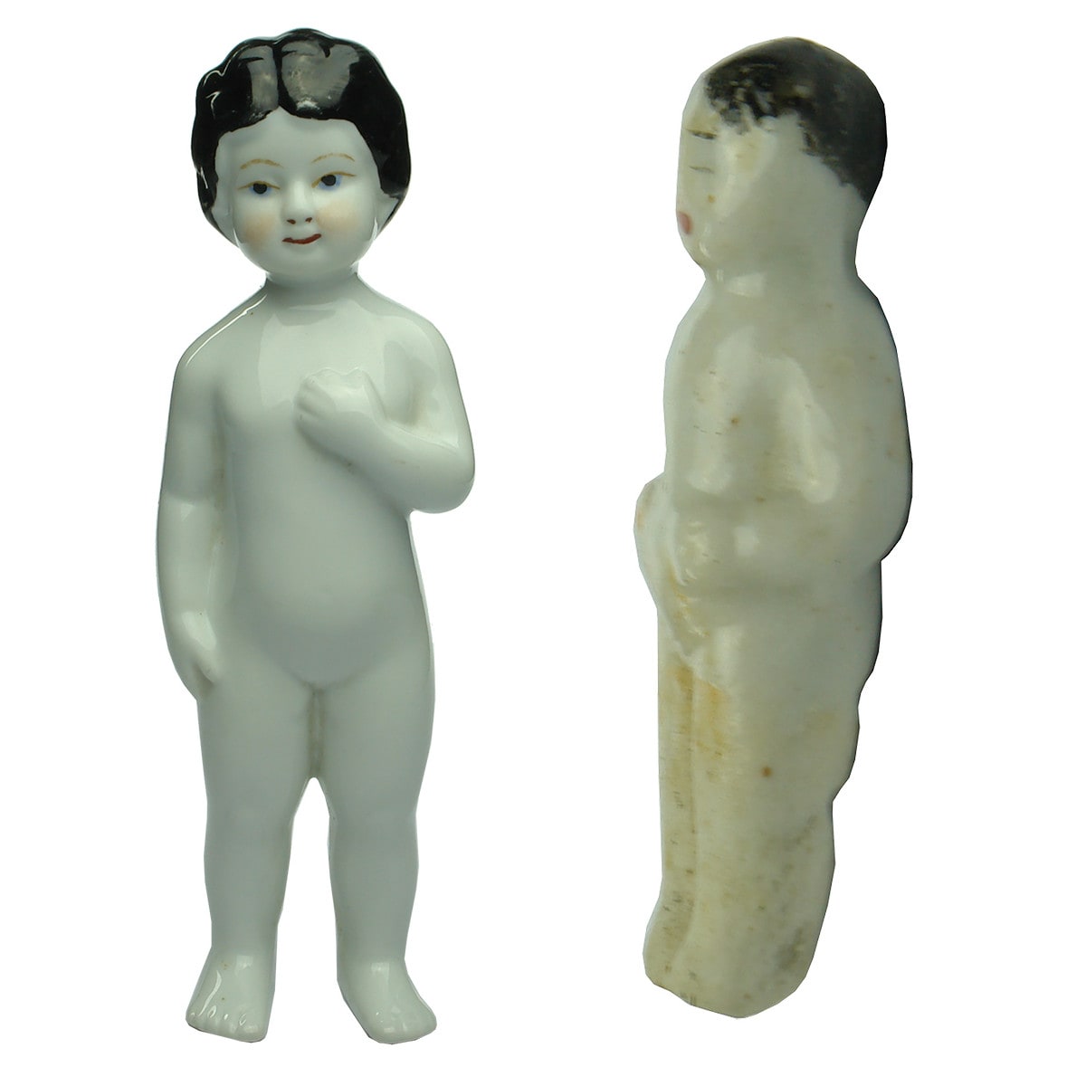 Largest and Smallest Dolls! Porcelain black haired doll and pudding doll with similar design.