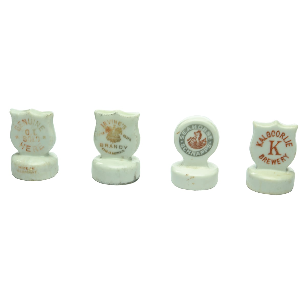 Four Ceramic Bottle cork covers. Irvine's Brandy; Kalgoorlie Brewery; OT & Seahorse Schnapps.