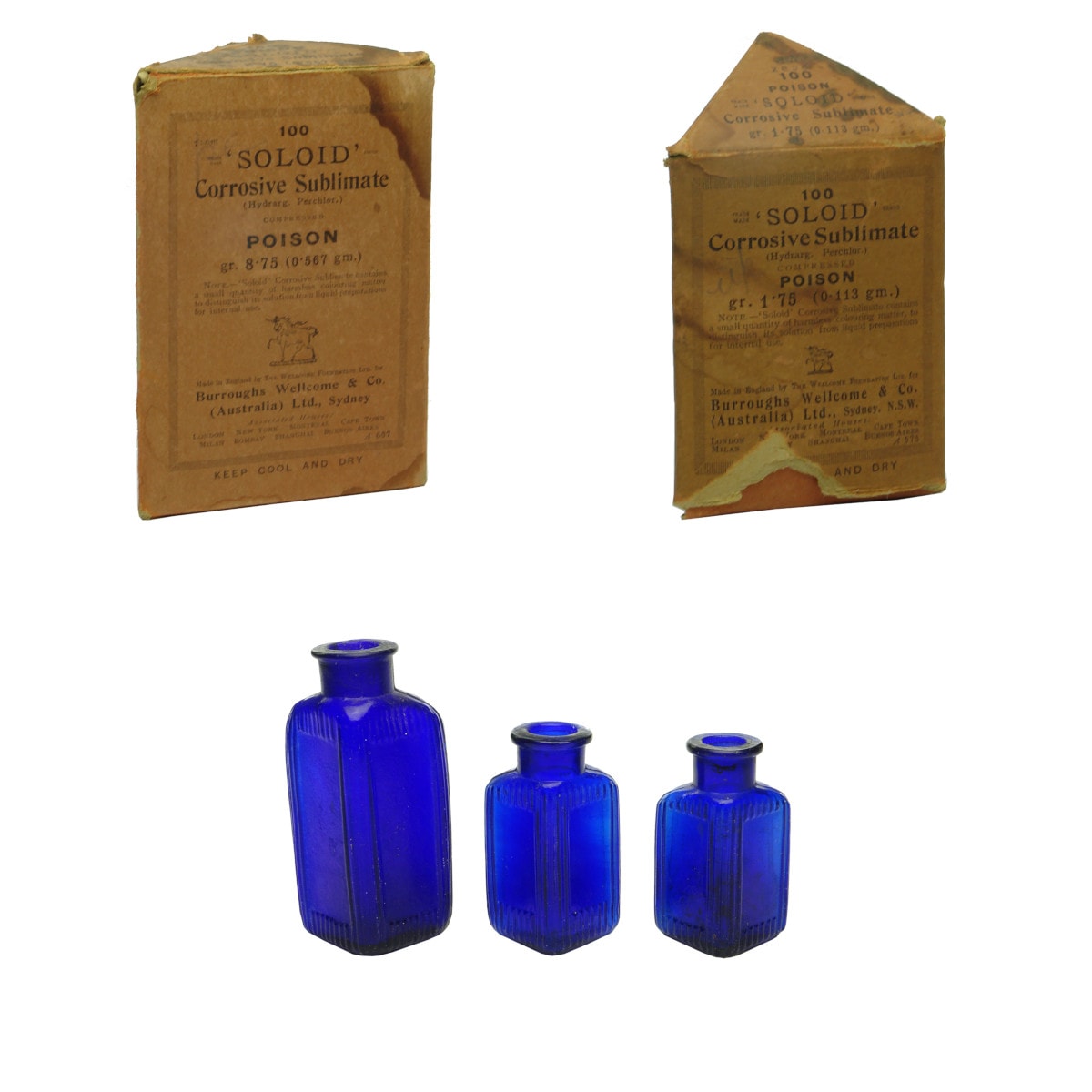 Five Burroughs Wellcome Soloid bottles. Cobalt Blue. Two with original boxes.