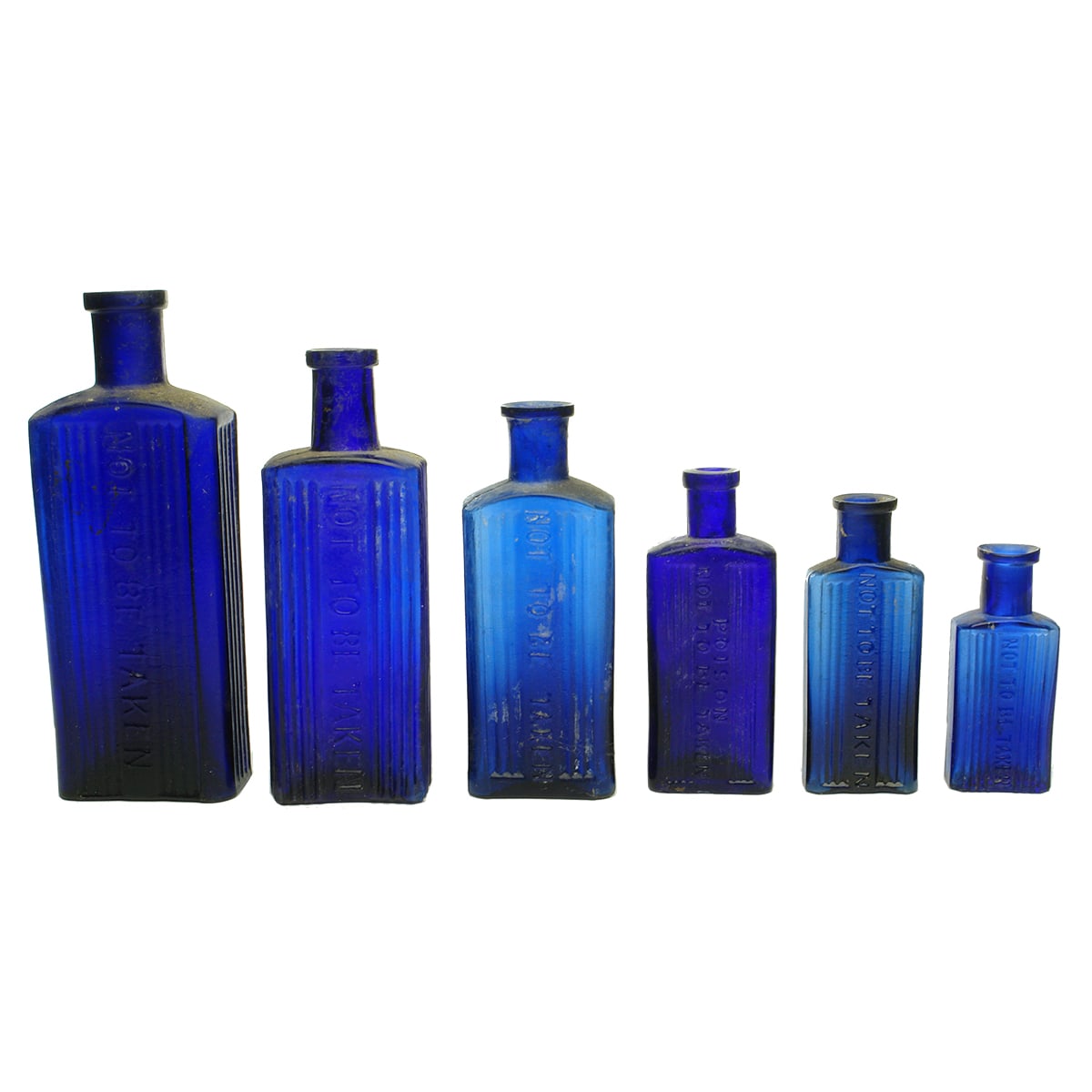 Six Oblong Cobalt Blue Not to be Taken poisons. 6 oz to 1/2 oz.